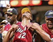  ?? RONALD MARTINEZ / GETTY IMAGES ?? James Posey (42), now on the Cavaliers staff, played two seasons with the Heat and was a key member of the 2006 NBA title team.