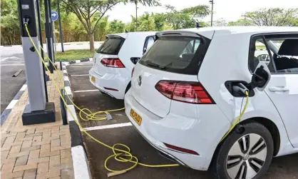  ?? Photograph: Simon Maina/AFP/Getty Images ?? VW is charging ahead with its EV plans but critics think weak emissions targets may incentivis­e other carmakers to make more of the more profitable petrol or diesel vehicles.