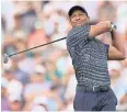  ?? AFP ?? Tiger Woods plays a shot at the PGA Championsh­ip.