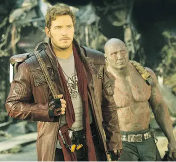  ??  ?? Chris Pratt and Dave Bautista — as Star-Lord and Drax — and the rest of the gang are back in Guardians of the Galaxy Vol. 2. Chris Lackner expects the Marvel movie to be No. 1 at the box office in the coming week.