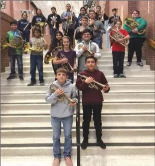  ?? Courtesy photo ?? From bottom to top Junior High Band Brass; percussion­s: Tristen Pugh, Trystan Gonzales, Alyssa Doll, Marco Salinas, Ashley Melendez, Armando Bravo, Matthew Cuellar, Gavin Barnett, Tyson Hodges, Jayden Overton, Tyler Ramirez, John Maniyali, Alysandra De La Cruz, Cloe Viasana, Isaac Collazo, Jeremiah Austin, Zachary Conner, Joshua Dominguez, and Joshua Rios.