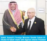  ??  ?? BAKU: Kuwait’s Foreign Minister Sheikh Sabah AlKhaled Al-Sabah meets with Algerian Interim President Abdelkader Bensalah. — KUNA Photos