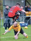  ?? Photo: Iain Ferguson, The Write Image ?? Returning to the Fort team after a few years, former captain Andy Martin is leapt over by Jordan Leyden.