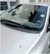  ?? Picture: SUPPLIED ?? LETHAL: At least 12 bullet holes were visible in the car in which Rashied Staggie was attacked in Salt River on Friday.