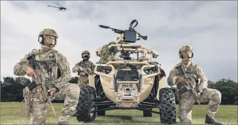  ??  ?? ‘BATTLEFIEL­D ADVANTAGE’ force
The trials involving Royal Marines of 40 Commando were designed to create a combined man-andmachine