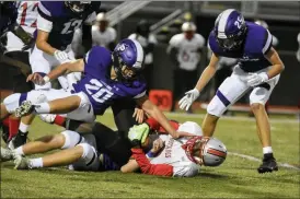  ?? BARRY TAGLIEBER — FOR MEDIANEWS GROUP ?? Phoenixvil­le’s Jaden Blanding brings down Dobbins’ Edward Brown on Sept. 6.