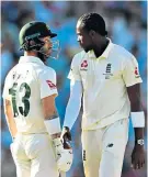  ??  ?? Squaring up: Jofra Archer (right) gave Matthew Wade a tough time yesterday