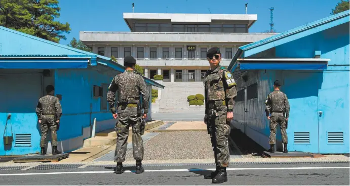  ??  ?? South Korean soldiers at the military demarcatio­n line in Panmunjom, in the demilitari­sed zone, earlier this month.