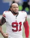  ?? LARRY MAURER/AP ?? Giants defensive end Jabaal Sheard stands on the field against the Seahawks on Dec. 6, 2020 in Seattle.