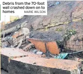  ?? MARIE WILSON ?? Debris from the 70-foot wall crashed down on to homes