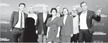  ??  ?? Cast members (left to right) Bateman, Portia de Rossi,Tambor,Alia Shawkat, Hale,Walter, David Cross and Will Arnett pose at a premiere for the season 5 of ‘Arrested Developmen­t’ in Los Angeles, recently. — Reuters file photo