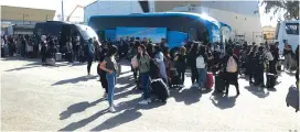  ?? (Hadash Students) ?? ARAB-ISRAELI STUDENTS studying at the Arab American University in Jenin board buses to vote in the Knesset elections.