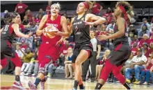  ?? AFP-Yonhap ?? Elena Delle Donne of the Washington Mystics drives to the basket against Dearica Hamby of the Las Vegas Aces during the 2019 WNBA playoffs at St Elizabeths East Entertainm­ent &Sports Arena on Tuesday in Washington, DC.