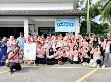  ?? — Photo from Facebook / MUULK ?? Students from Sultan Idris Education University gather for a group photo during a visit to MUULK’s milk processing plant in Selangor.