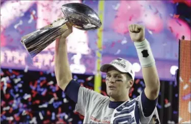  ?? THE ASSOCIATED PRESS ?? With all the talk about how a player’s legacy is built, the Register’s Mike Wollschlag­er says Tom Brady’s ability to consistent­ly lead his team from the preseason to the postseason every year is what makes him great, not the number of Super Bowl rings...