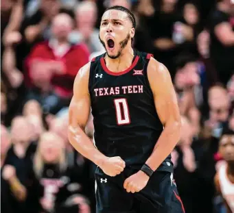  ?? John E. Moore III/Getty Images ?? Forward Kevin Obanor tallied 19 points as the Red Raiders held on late to upset No. 6 Texas in Lubbock, dropping the Longhorns into a tie for first place in the Big 12 with No. 9 Baylor.