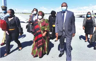  ?? - Pic- ?? Former president of Malawi Mrs Joyce Banda with Matabelela­nd Provincial Affairs and Devolution Minister Richard Moyo soon after landing at the Victoria Falls Internatio­nal Airport yesterday.