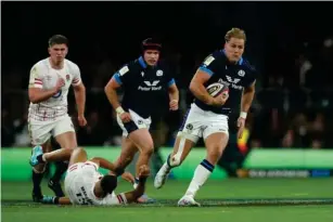  ?? ?? Duhan van der Merwe’s first - ha l f try exposed Eng l and’s poor tack l ing (PA)