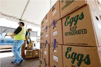  ?? Rogelio V. Solis/Associated Press ?? Cal-Maine Foods Inc., the largest producer of fresh eggs in the United States said Tuesday that it had stopped production at a Texas plant after bird flu was found in chickens there.