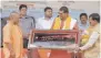  ?? — PTI ?? UP CM Yogi Adityanath presents a memento to Nepalese people at Ramkatha Park in Ayodhya on Saturday.