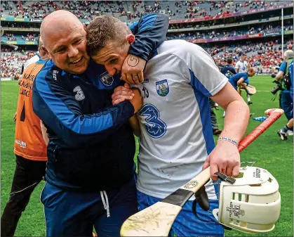  ??  ?? RELEASE: Waterford boss Derek McGrath and Shane Bennettt celebrate after beating Cork in the All-Ireland semi-final