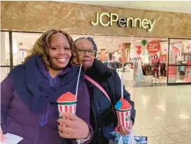  ?? ?? Devonne Jackson and her mother, Carla Jackson, went looking for early Black Friday deals on jewelry the week before Thanksgivi­ng at Marley Station Mall.