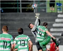  ?? PHOTO: WARWICK SMITH/STUFF ?? Palmerston North Marist defender Graeme Craven, right, contests a freekick against Wairarapa United goalkeeper Coey Turipa.