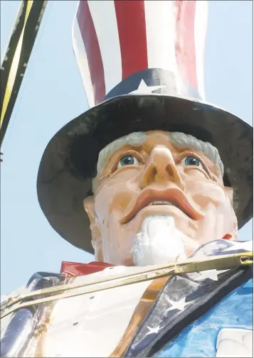  ?? Rob Ryser / Hearst Connecticu­t Media ?? The Uncle Sam statue is installed outside the Danbury Railway Museum on White Street on Wednesday.