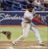  ?? CHRIS YOUNG - THE ASSOCIATED PRESS ?? Boston Red Sox’s Eduardo Nunez hits an RBI double off Toronto Blue Jays starting pitcher Brett Anderson during the sixth inning of a baseball game Tuesday, Aug. 29, 2017,