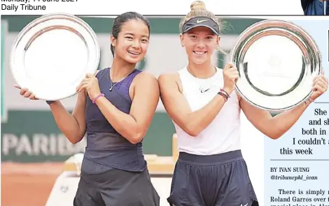  ?? PHOTOGRAPH COURTESY OF ROLAND GARROS ?? ALEX Eala (left) and Russian doubles partner Oksana Selekhmete­va beam with pride after winning the girls title at Roland Garros.