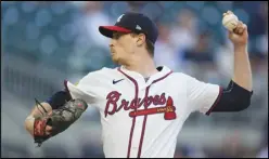  ?? Associated Press ?? Atlanta Braves starting pitcher Max Fried delivers to a Miami Marlins batter in the first inning of a baseball game Tuesday, in Atlanta.