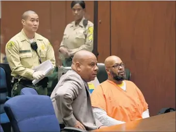  ?? Irfan Khan Los Angeles Times ?? FORMER rap mogul Marion “Suge” Knight, right, with lawyer Mathew Fletcher in court in 2015. Authoritie­s arrested Fletcher and another attorney this week, accusing them of acting as “accessorie­s after the fact.”