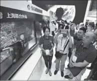  ?? PROVIDED TO CHINA DAILY ?? Visitors watch a live show of a 5G network trial test during the Mobile World Congress in Shanghai in June.