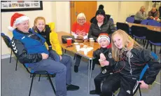  ?? 50_c49lights0­7 ?? From left, James Macphee, Lynsey Macphee, 10, Margaret Raeside, Karen Irwin, Jamie Macphee, six, and Lileigh Allen, nine, enjoyed the festive atmosphere at the Salvation Army citadel where free soup and snacks were served.