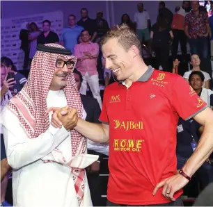  ?? Supplied photo ?? psa chairman ziad al turki congratula­tes nick matthew. —