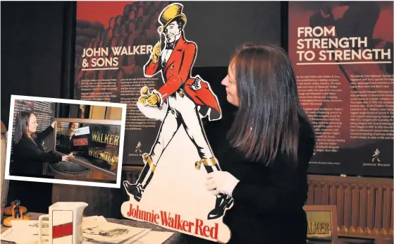  ??  ?? Striding out Archivist Christine McCafferty prepares the exhibition. There is plenty of memorabili­a and important company documents to see