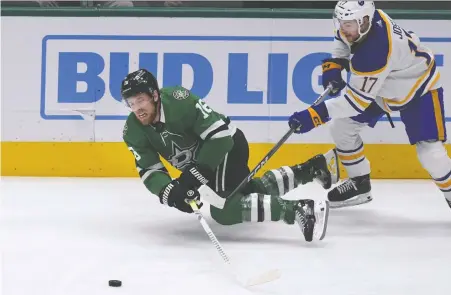  ?? LM OTERO/THE ASSOCIATED PRESS FILES ?? Dallas Stars centre Joe Pavelski, here being checked by Buffalo Sabres centre Tyson Jost on April 9, has played over 1,500 regular season and playoff games since his NHL debut in 2006. He turns 40 in July and has never won a Stanley Cup.