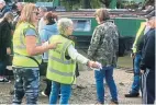  ?? ?? Queues at the Clock Warehouse basin for the trip boats which took visitors through the village between Shardlow Lock and Derwent Mouth Lock.