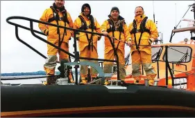  ??  ?? Wicklow RNLI coxswains on board the Shannon class lifeboat Jock and Annie Slater in Poole.