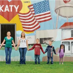  ??  ?? A local family, the Brights, at Katy Heritage Park, which celebrates the town’s history