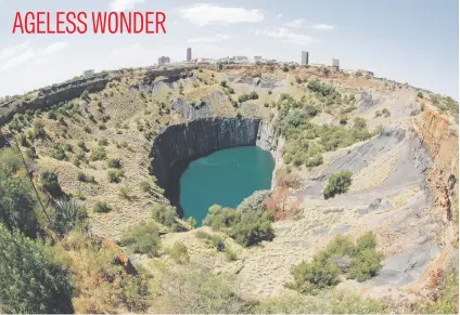  ?? Picture: EPA-EFE ?? The Kimberley Big Hole is claimed to be the world’s largest and deepest hand-excavated hole. The Big Hole was used for open cast diamond mining. It runs 215m deep, right in the middle of the town.