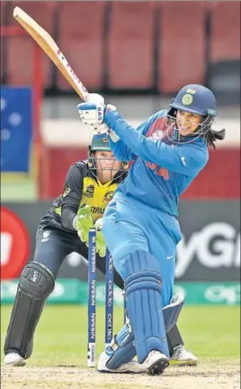  ?? GETTY ?? ■ Smriti Mandhana held the Indian innings together after early setbacks before spinners completed the domination over Australia in a match that decided the Group B toppers.