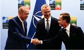  ?? Photograph: Filip Singer/EPA ?? At a Nato summit in July in Lithuania, the Turkish president, Recep Tayyip Erdoğan (left), shakes hands with the Swedish prime minister, Ulf Kristersso­n, as the secretary general of Nato, Jens Stoltenber­g, looks on.