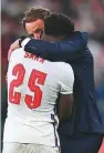  ?? AP ?? Gareth Southgate hugs ■
Bukayo Saka after the penalty shootout.