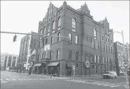  ?? MICHAEL MCANDREWS | SPECIAL TO THE COURANT ?? THE GRAND ON ANN, at the corner of Ann and Allyn streets in Hartford, was the first apartment project to open in the recent wave of redevelopm­ent in Hartford. The building was a former Masonic Temple.