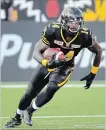 ?? BARRY GRAY HAMILTON SPECTATOR FILE PHOTO ?? Terrell Sinkfield heads up field for the Ticats in this Aug. 15, 2015, game.