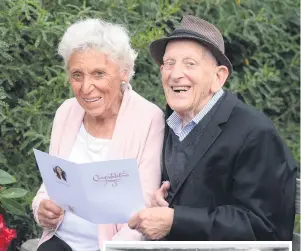  ?? PHOTOS: LINDA ROBERTSON/SUPPLIED ?? Platinum pair . . . Colleen (86, nee Rowe) and George (93) Reid celebrate 70 years of marriage at the weekend. Inset: a picture of the Beau Monde, where the couple met.