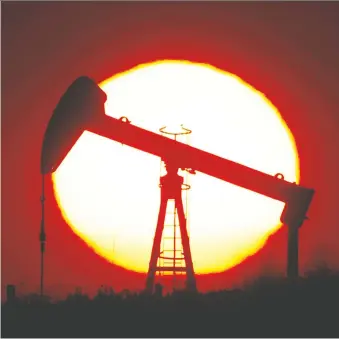  ?? CHRISTIAN HARTMANN/REUTERS FILES ?? Canadian oil stocks got a boost Wednesday on investor optimism. While prices have risen to the US$30 range, producers are seen to just barely avoiding an operations loss at that level.