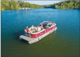  ?? (Courtesy Photo) ?? Pontoon boats are available for rent at the Marina at Lakepoint on Loch Lomond lake.