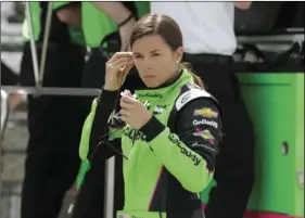  ??  ?? Danica Patrick prepares to drive on the opening day of practice for the Indy 500 auto race at Indianapol­is Motor Speedway in Indianapol­is, on Tuesday. AP PHOTO/MICHAEL CONROY
